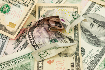 Crumpled dollar bill, background of dollar bills, texture