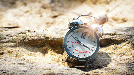 Time management on word clock on tropical beach. Effective and productivity concept and work life balance idea