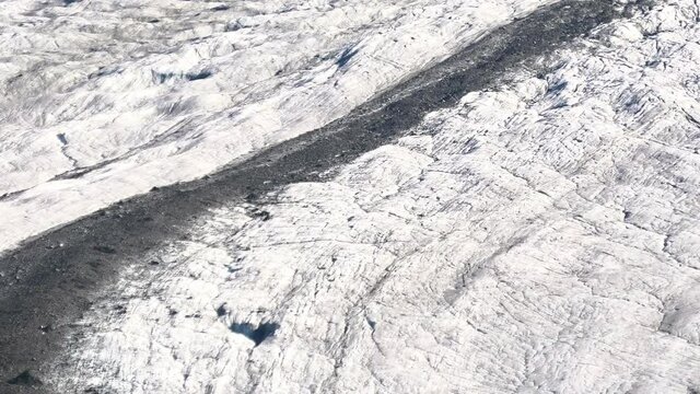 close of the ice and snow of Great Aletsch Glacier, the largest glacier in the Alps and UNESCO heritage from Moosfluh viewpoint in Canton of Valais, Switzerland, Europe. Summer season