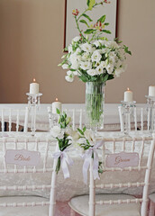 wedding decor. wedding table setup. Candels and white flowers