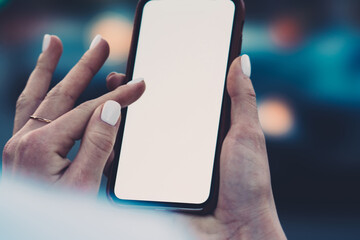 Anonymous woman browsing internet outside