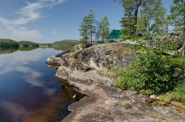 Fototapeta na wymiar View from Zayachiy Island on the Upper Pulongskoye Lake in Karelia (Russia)