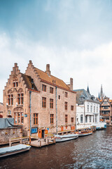 Naklejka na ściany i meble BRUGES, BELGIUM - April 13, 2018: Street view of downtown in Bruges, Belgium
