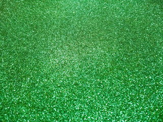 Fototapeta premium Green glitter with selective focus.