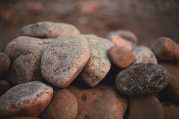 Fototapeta na wymiar Sea stones by the sea