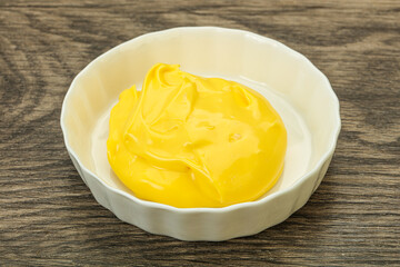 Natural cheese sauce in the bowl