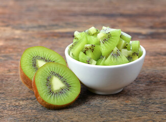 kiwi fruit on wooden background