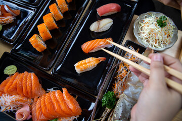 Japanese sushi set , Sushi nigiri rolls and sashimi served in japanese food restaurant menu