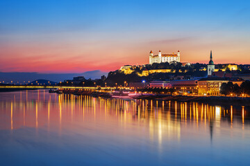 Fototapeta na wymiar Bratislava castle over Danube river and Bratislava old town, Slovakia