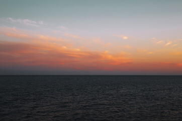 Naklejka na ściany i meble Seascape at sunset. Sea and sky