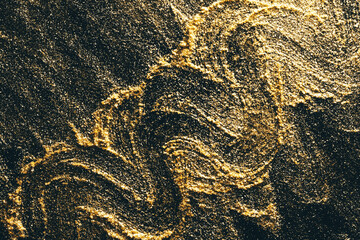 Golden powder scattered in patterns