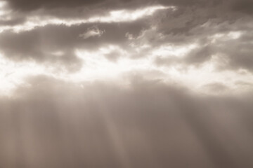 Fototapeta premium Sun lights through sky clouds with old vintage effect wallpaper