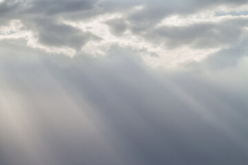 Obraz premium Sun lights through sky clouds for peaceful spiritual shiny wallpaper