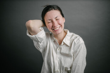 Woman laughing portrait at home