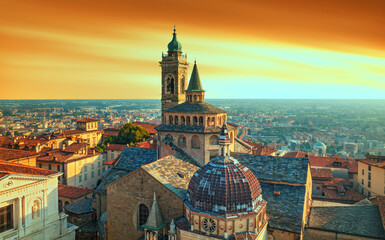 Bergamo city - Scenic sunse view of the Old city and Basilica of Santa Maria Maggiore and Cappella...