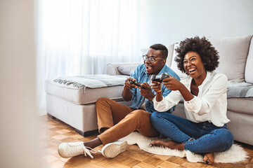 Happy friends playing video games with virtual reality glasses - Young people having fun with new...