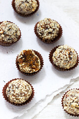 Homemade healthy candy made from dried fruits, honey and nuts. Rustic style.