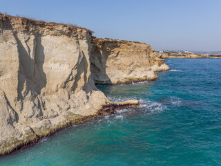 Fototapeta premium View of the coastline at the Plemmirio, a natural marine reserve near Syracuse, in the southern Sicily, Italy. The shot is taken in a sunny day