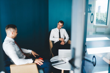 Fototapeta premium Confident colleagues working together in office