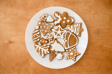 Tasty  homemade gingerbread tree, reindeer, star cookies with icing