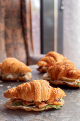 Filled crispy croissants. Vertical photo.