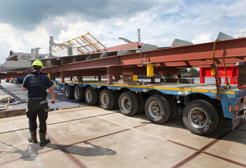 Transport of a aluminium hull part of a super sailing yacht. Ship building industry. Netherlands....