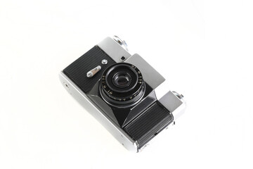 Old 35 mm SLR camera , released 70's on white background.