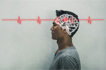 Red epicenter of the pain of brain. The silhouette of a man's head and volume image of the brain....