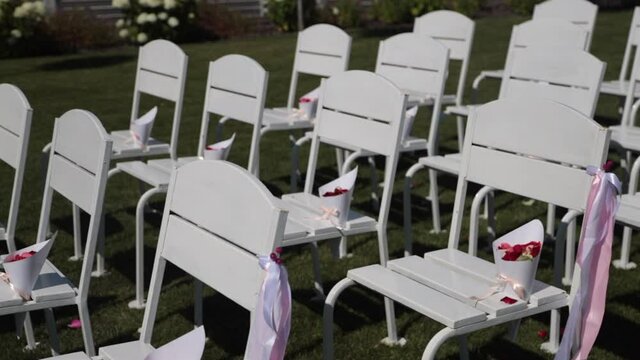  wedding chairs for an off-site ceremony. High quality FullHD footage