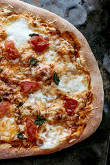 Homemade pizza margarita. Cooking at home.