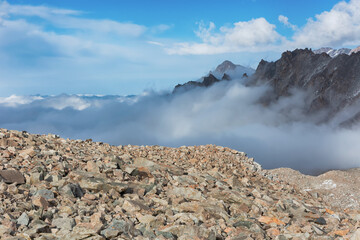 Mountain landscape view in Kyrgyzstan. Rocks, snow and stones in mountain valley view. Mountain...