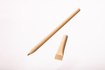 pen made of recycled paper. Environmentally friendly stationary supplies. Plastic pollution reduction concept. eco friendly modern ecological biomaterials. Zero waste concept.