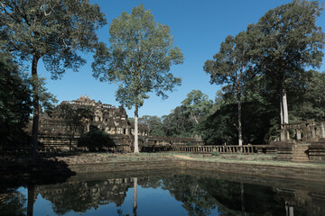 Fototapeta na wymiar The Baphuon is a three-tiered temple mountain in Angkor Thom, Siem Reap, Cambodia.