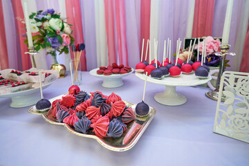 Fragment of a festive children's table with various sweets