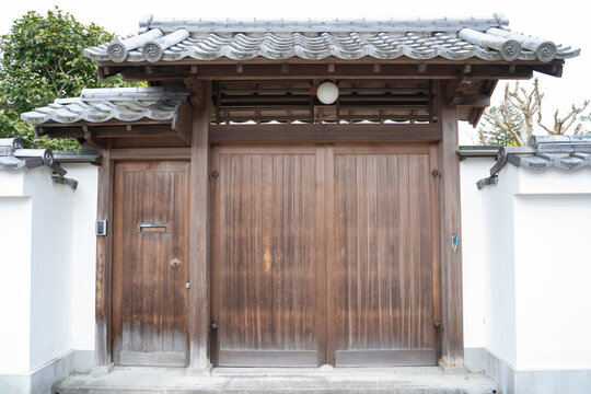 Old wood door house in japan.