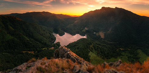 Fototapeta na wymiar Look at Endara dam and the Aiako Harriak three peaks at the natural park; on the Basque Country.