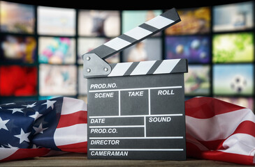 Clapperboard against the background of the USA flag. American cinema