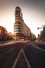 Fototapeten Look at the Gran Via (Main Street) of Madrid with its iconical theatres. © Jorge Argazkiak