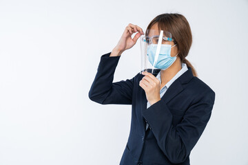 Businesswoman with face mask and Face shield  Woman  wearing protective mask. Corona virus protection.