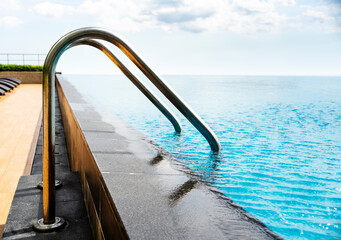 Swimming pool with stair and wooden deck