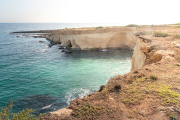 View of the coastline at the Plemmirio, a natural marine reserve near Syracuse, in the southern Sicily, Italy. The shot is taken in a sunny day