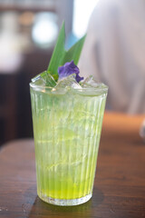 Iced pandan green juice on glass.