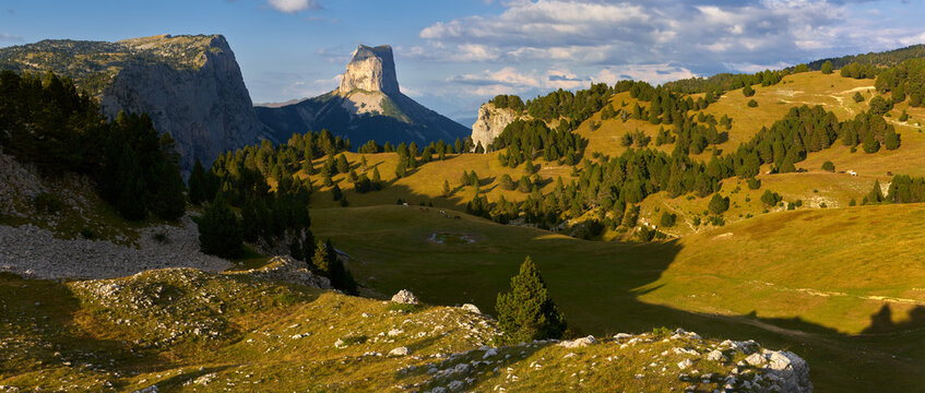 The Vercors High Plateaus and Mont Aiguille in Autumn at sunset (panoramic). Vercors Regional Natural Park, Isere, Rhone-Alpes, Alps, France
