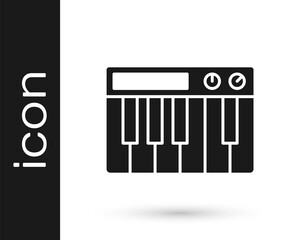 Black Music synthesizer icon isolated on white background. Electronic piano. Vector.