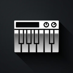 Silver Music synthesizer icon isolated on black background. Electronic piano. Long shadow style. Vector.
