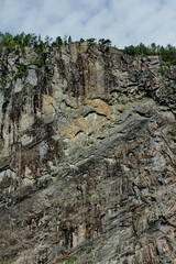 Obraz premium Dramatic view of a cliff in Osterfjord, Norway