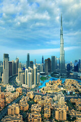 Fototapeta na wymiar Dubai - amazing city skyline with luxury skyscrapers at sunset, United Arab Emirates