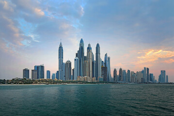 Fototapeta na wymiar Dubai Marina skyline, yachts and famous promenade, United Arab Emirates