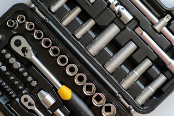 top view of the black case with collection kit of manual steel tools with copy space