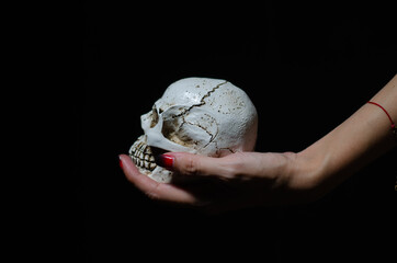 Human skull on  black background